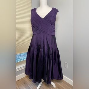 Deep purple formal dress figure flattering taffeta upper body on fit tea length